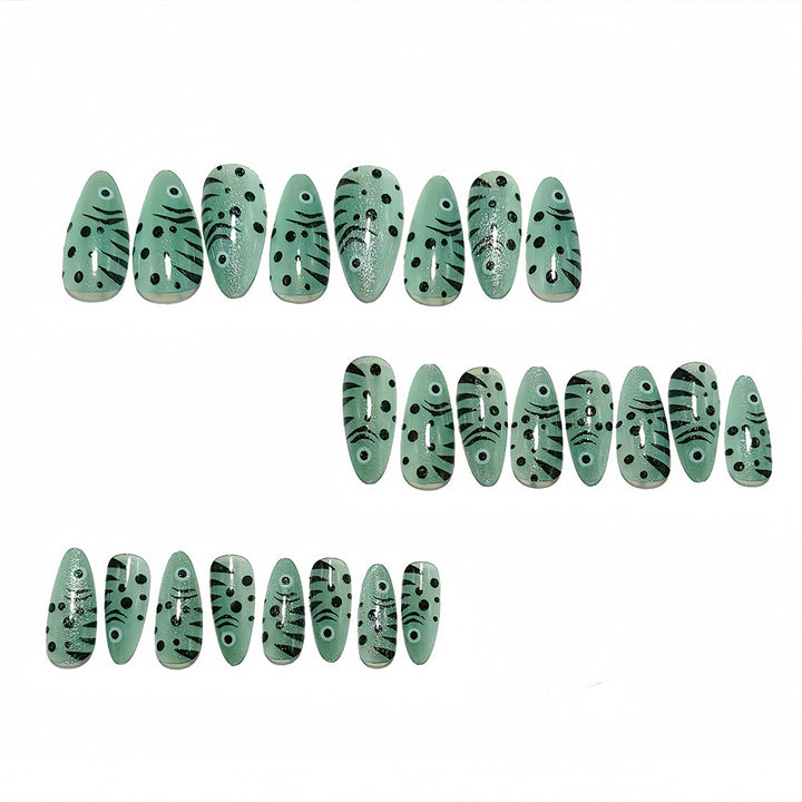 Creative animal motif artificial nails with glitter effects Stornfield