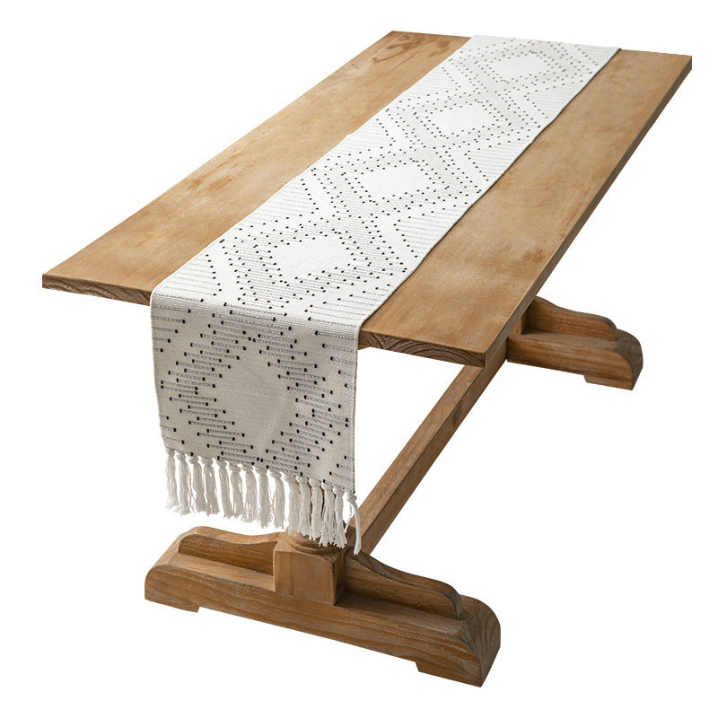 Handwoven table runner made of cotton blend with fringes and geometric dot jacquard Stornfield