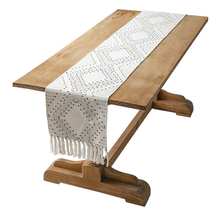 Handwoven table runner made of cotton blend with fringes and geometric dot jacquard Stornfield