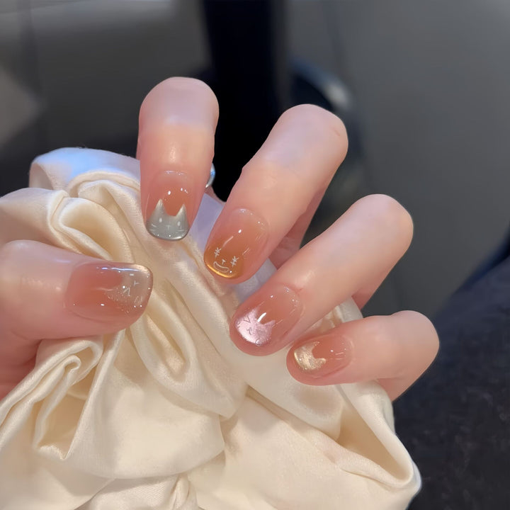 Artificial nail tips with playful cat design Stornfield