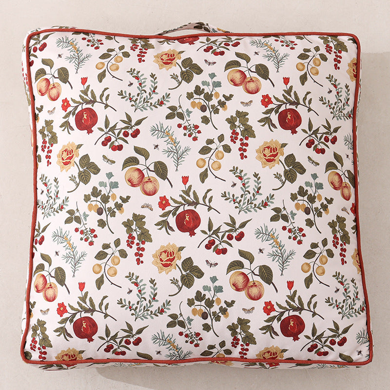 Large decorative seat and floor cushion with floral pattern