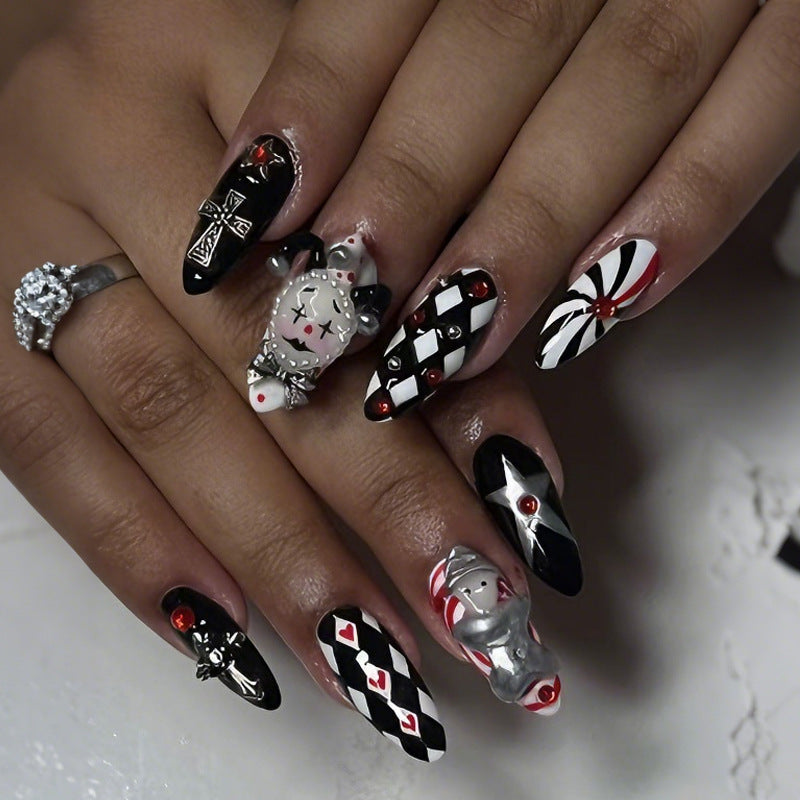 Nail art set with creative Halloween motifs and elegant accents Stornfield