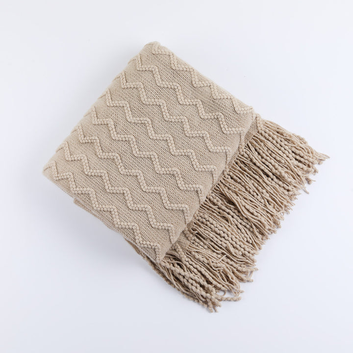 Women’s knitted blanket with textured wave pattern Stornfield