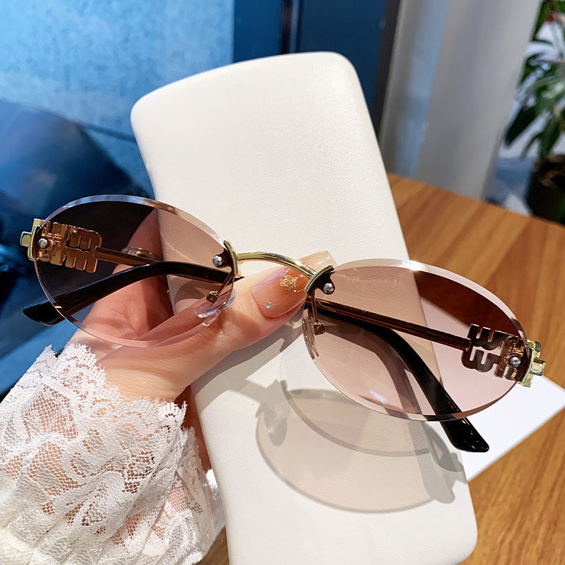 Ladies fashionable sunglasses in elegant oval design Stornfield