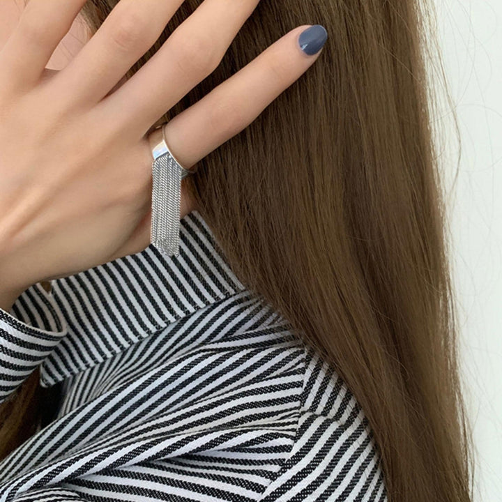 Stylish ring with filigree tassel design Stornfield