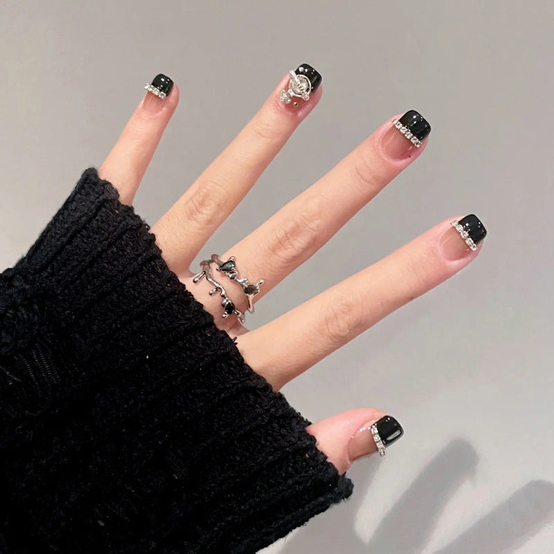 Decorative Press-On Nail Art with Elegant Black Tips Stornfield
