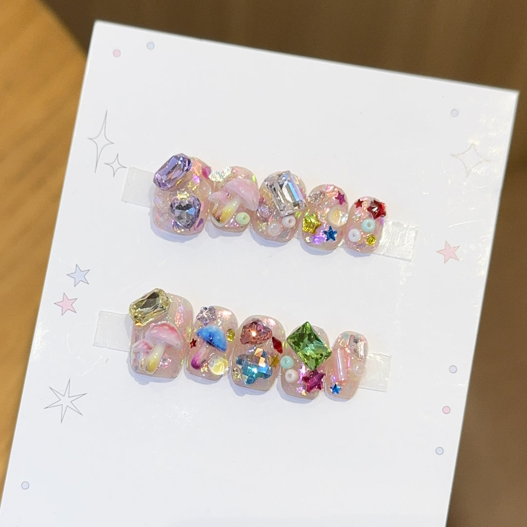 Artificial nails with sparkling crystal accents Stornfield