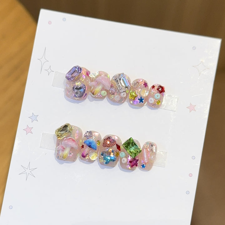 Artificial nails with sparkling crystal accents Stornfield