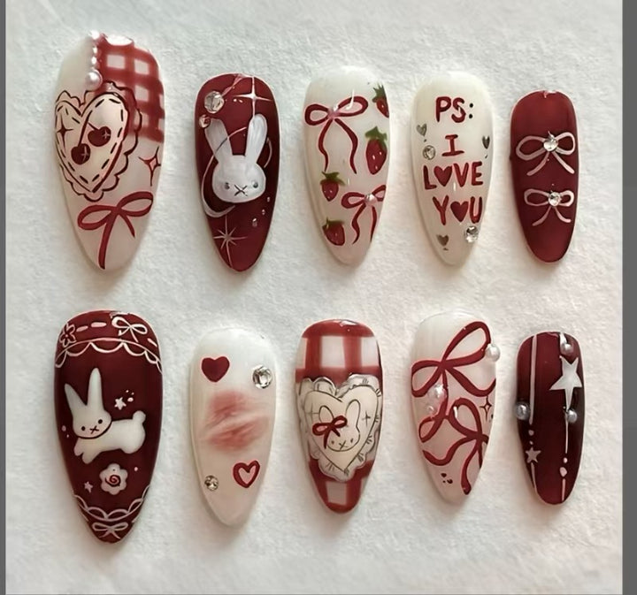 Artificial nails with romantic love motifs Stornfield