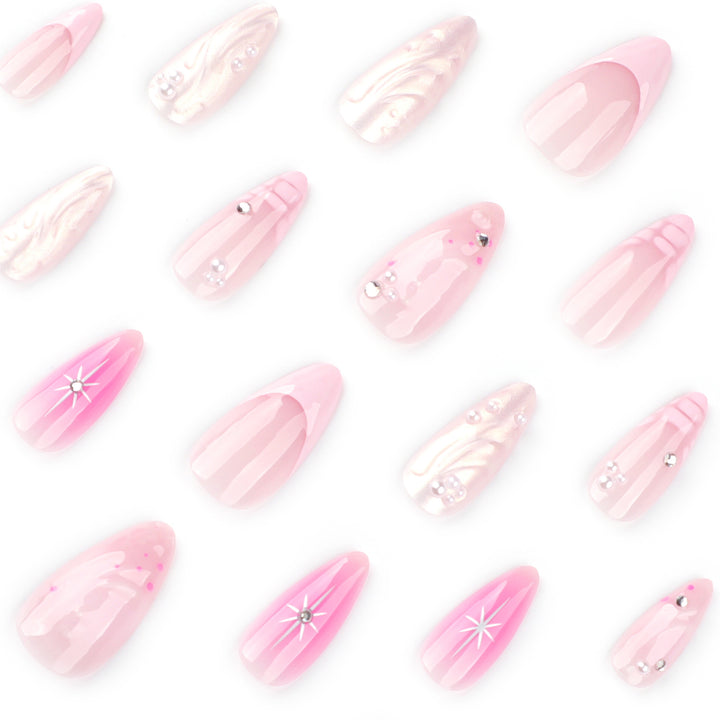 Artful Nail Extensions with Glitter and Shell Motifs Stornfield