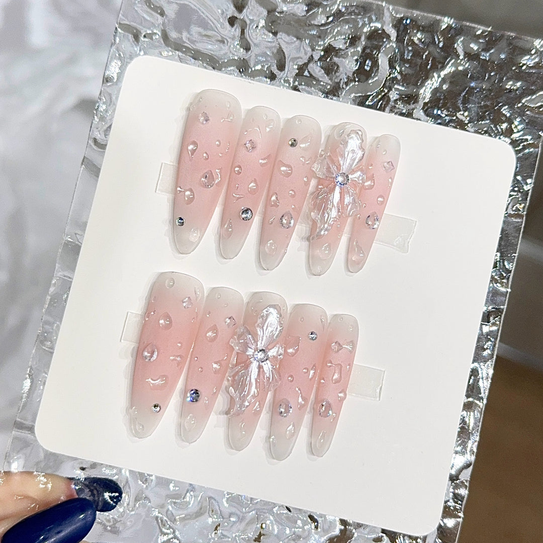Glamorous artificial nails with sparkling accents Stornfield