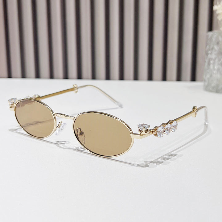 Fashion-Forward Oval Sunglasses with Crystal Accents Stornfield