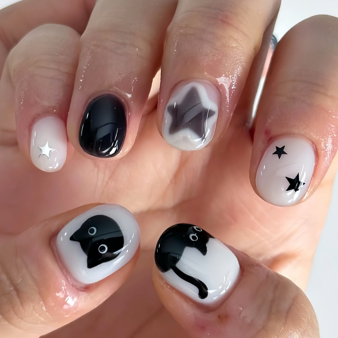 Playful Cat and Star-Themed Press-On Nail Art Extensions Stornfield