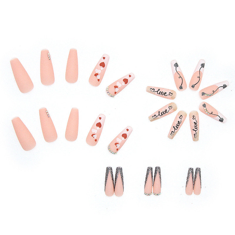 Acrylic nail set with romantic heart and glitter decorations Stornfield