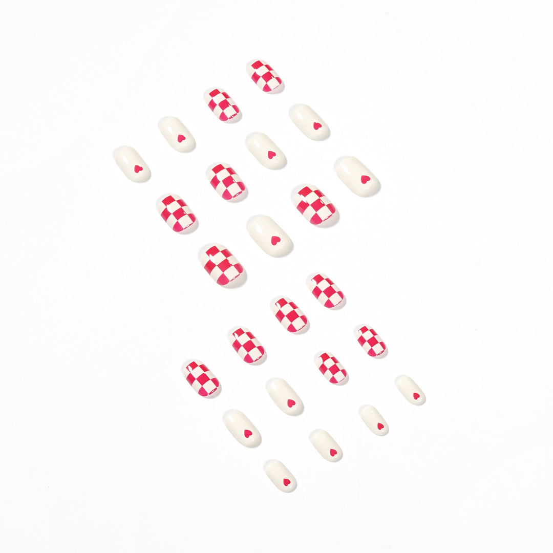 Trendy Nail Art with Heart and Checkered Patterns Stornfield