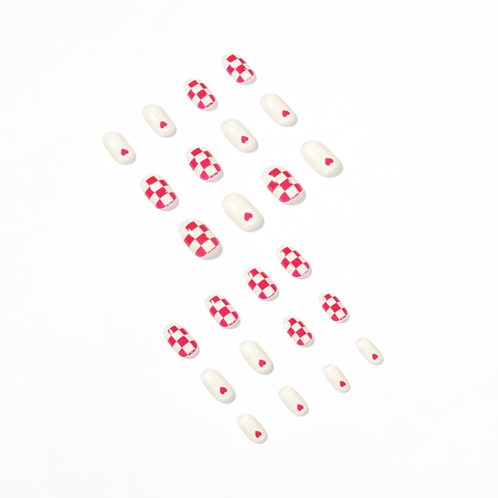 Trendy Nail Art with Heart and Checkered Patterns Stornfield