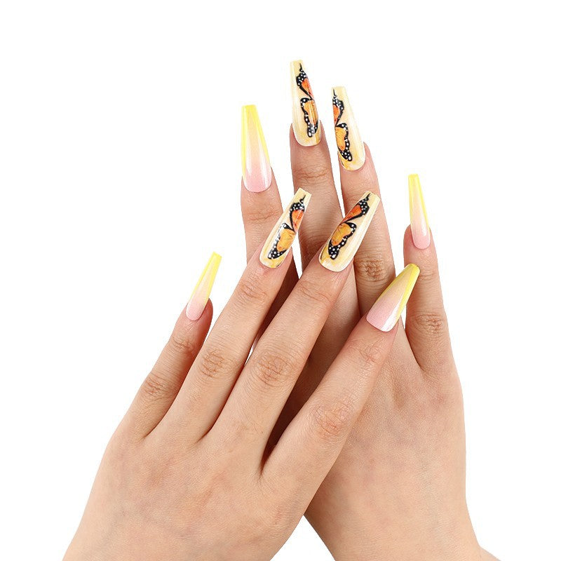 Art nails with butterfly motif Stornfield