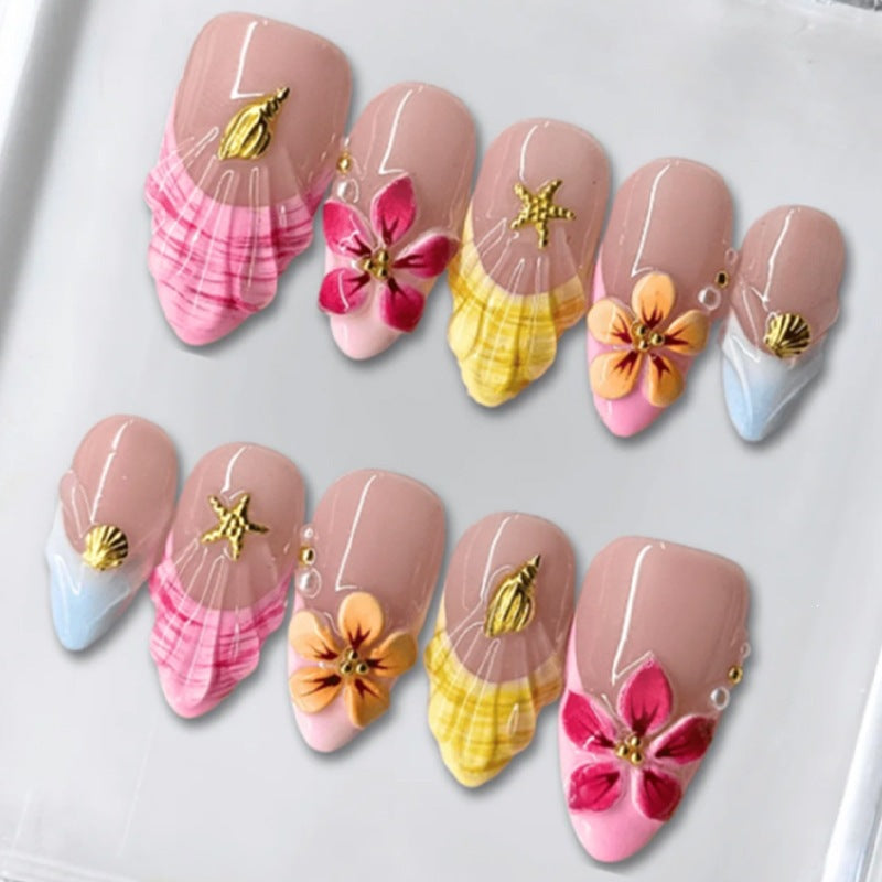 Artificial nail set with floral patterns and sparkling accents Stornfield