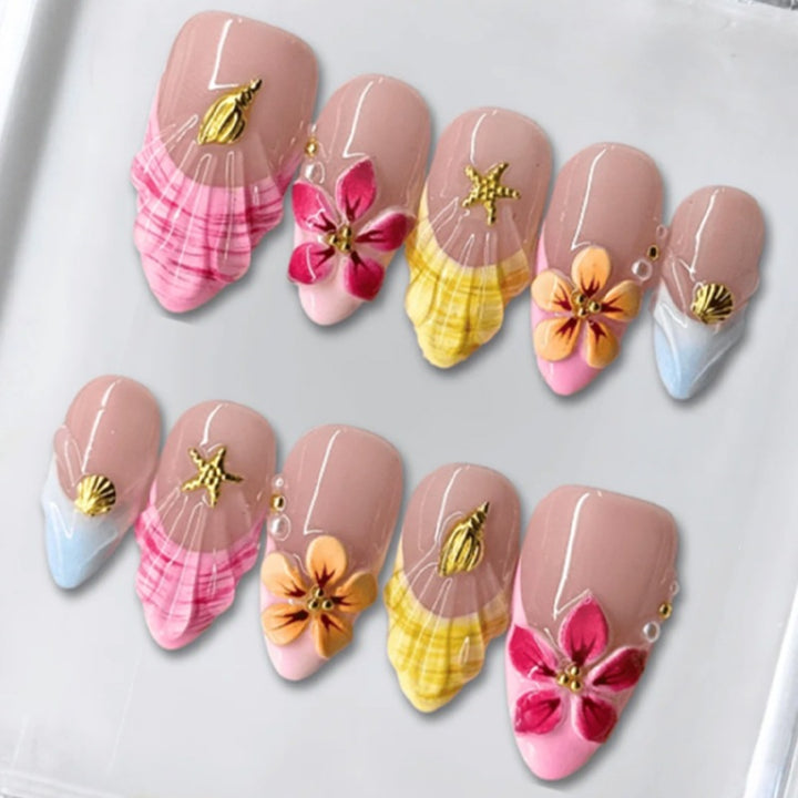 Artificial nail set with floral patterns and sparkling accents Stornfield