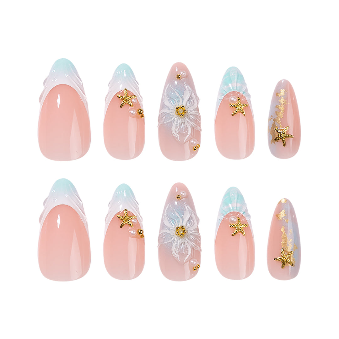 Artful stiletto nails with floral and glamorous accents Stornfield