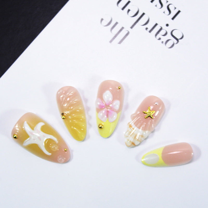 Artificial nail set with maritime shell and flower motifs Stornfield