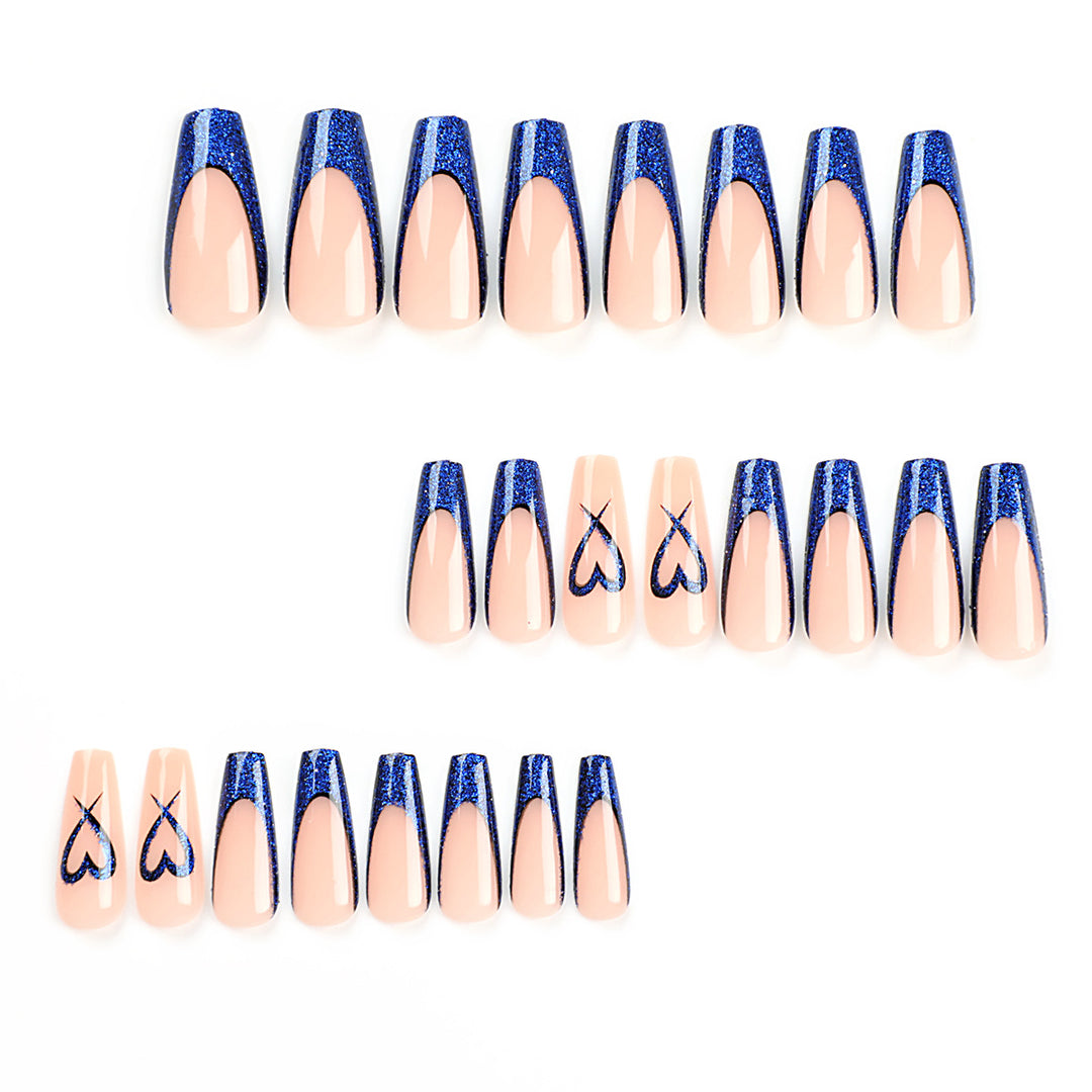 Artificial nails with glitter accents and unique heart design Stornfield