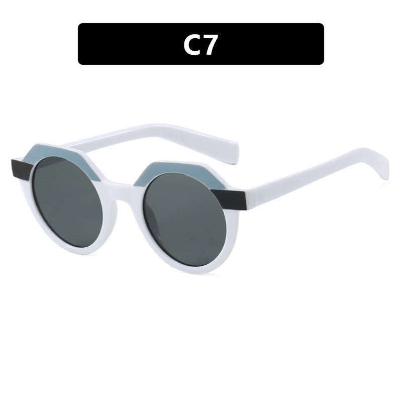 Ladies extravagant round sunglasses with colored accented frame Stornfield