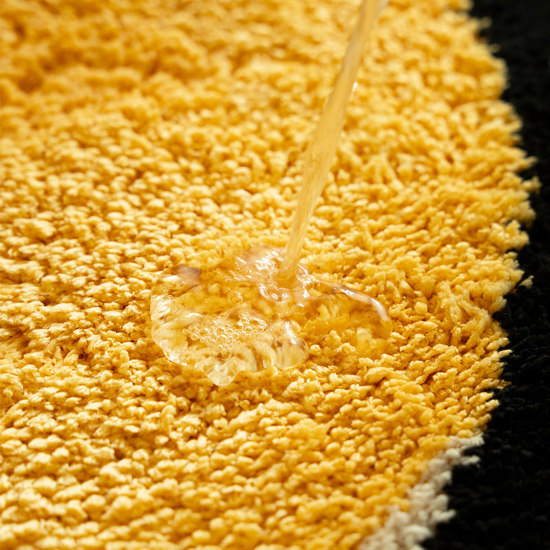 Playful children's rug in cheese shape with tufted chenille surface and non-slip backing Stornfield