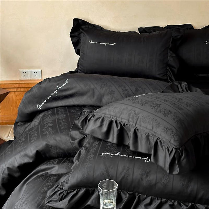 Luxurious satin bedding set with ruffles and jacquard floral pattern