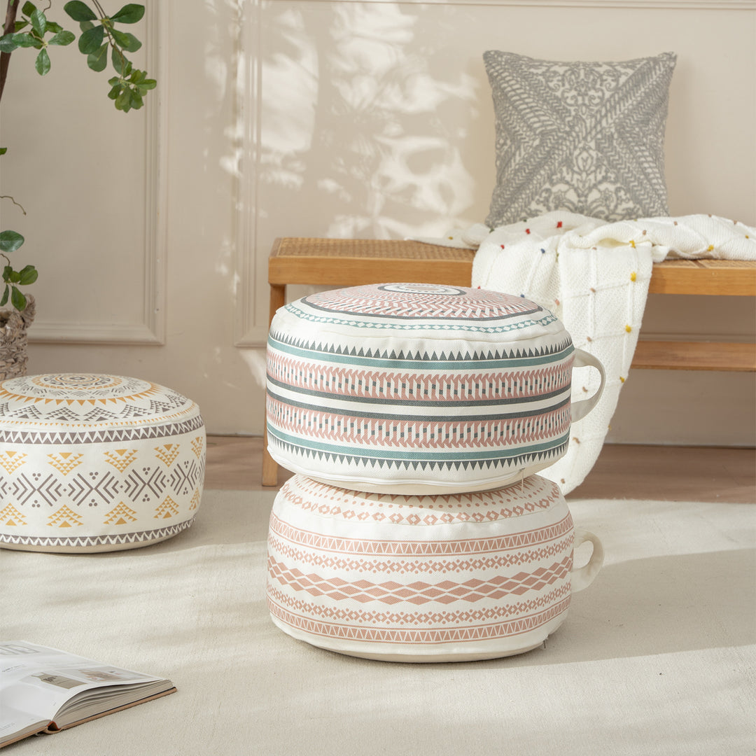 Round padded floor seat pouf with woven ethnic pattern and carrying handle Stornfield