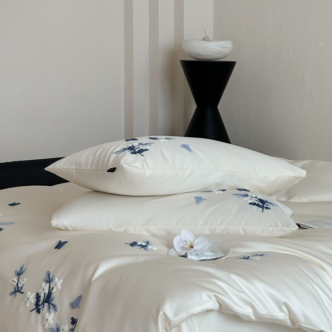 Luxurious satin bedding set with blue flower embroidery