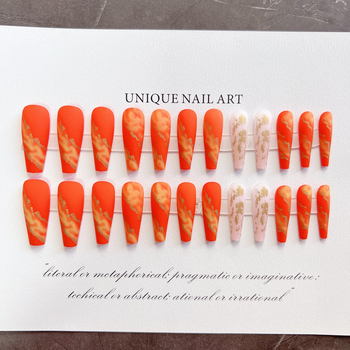 Artistic Press-On Nails with Gold Accents