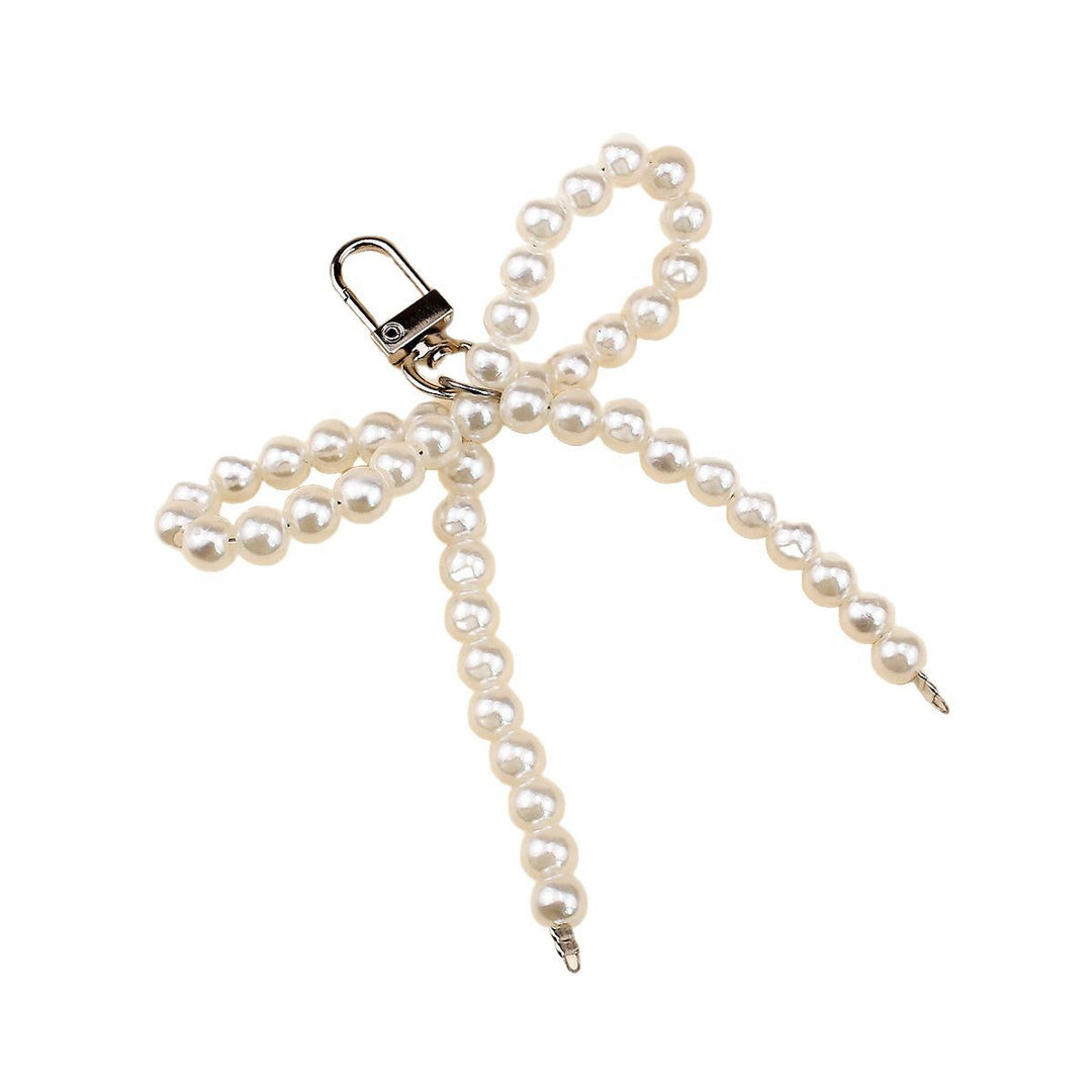 Elegant Pearl Bow Brooch Stornfield