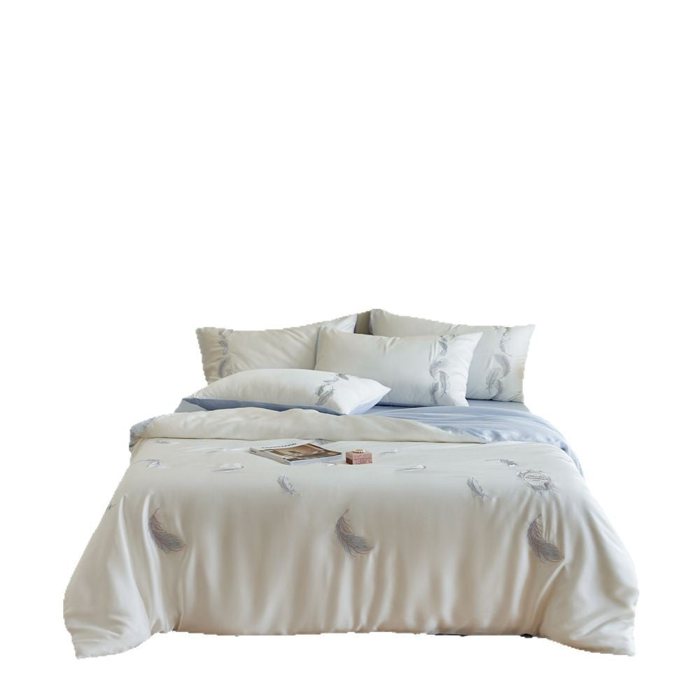 Reversible cotton satin bedding set with finely embroidered feather motifs and a silky-matte finish