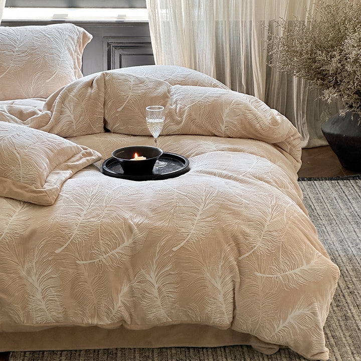 Quilted bed linen set made of fine cotton satin with embossed leaf quilting and hotel closure