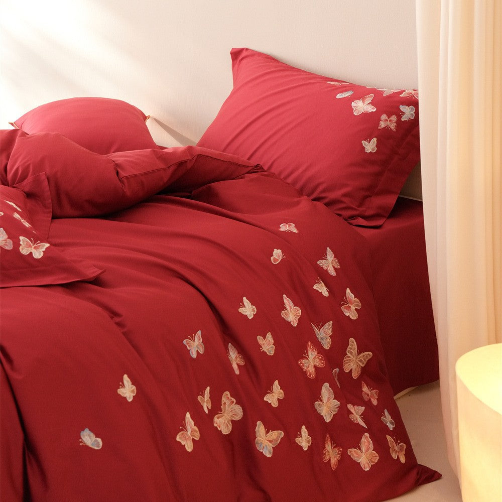 Embroidered bedding set made of cotton satin with butterfly appliqué