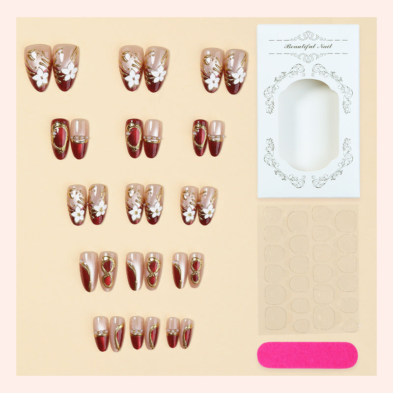 Artistic Press-On Nail Set with Floral and Metallic Accents Stornfield