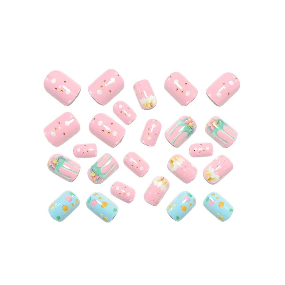 Artificial nails with playful cupcake design Stornfield