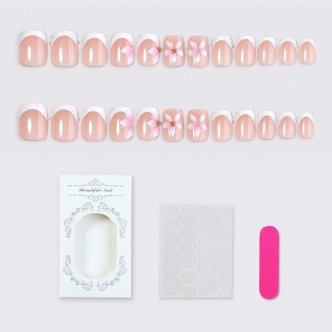 Artificial nail set with delicate floral designs Stornfield