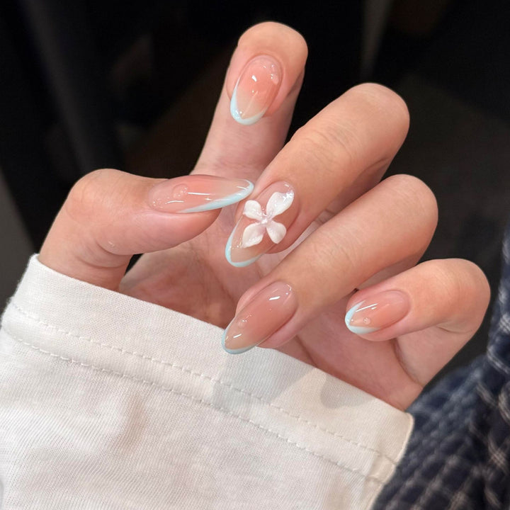 Artificial nails with elegant floral accents Stornfield