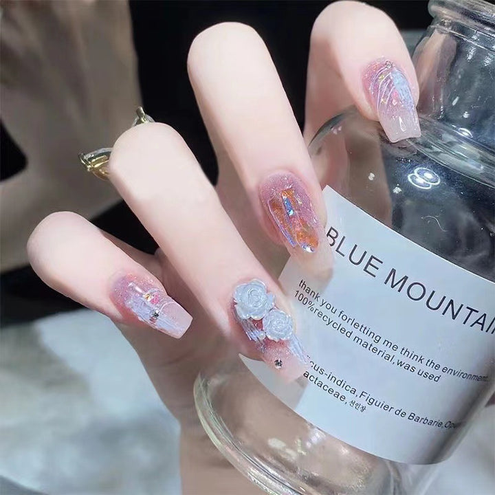 Artistic nail art with floral embellishments Stornfield