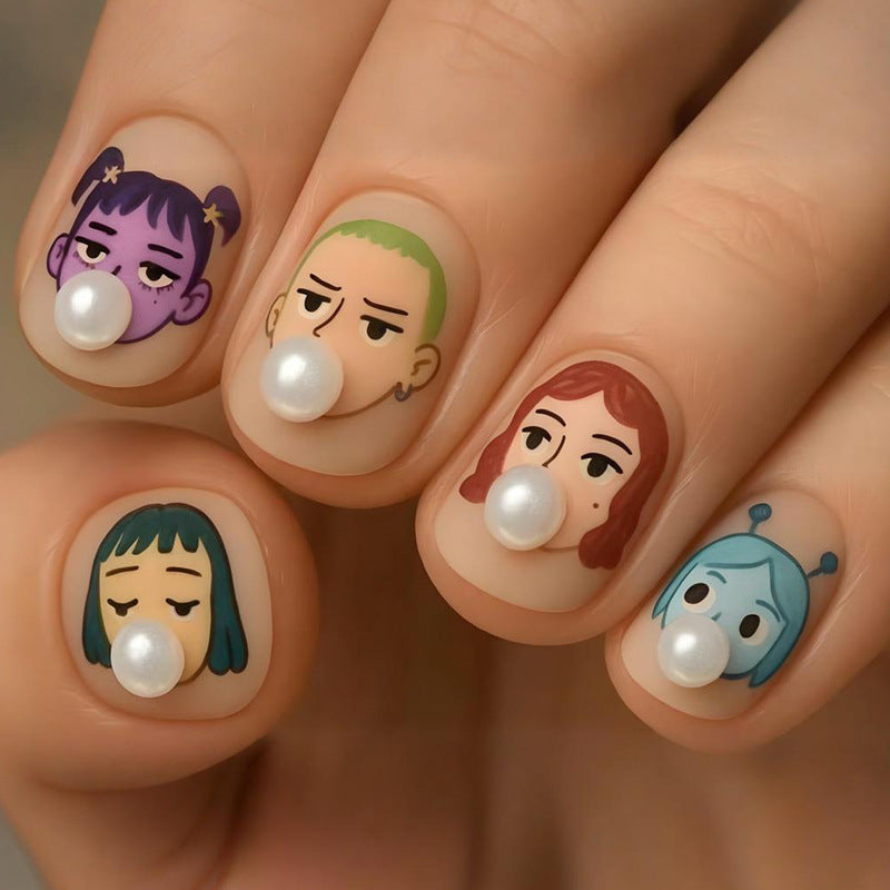 Artifical nail set with creative character designs and elegant pearl accents Stornfield