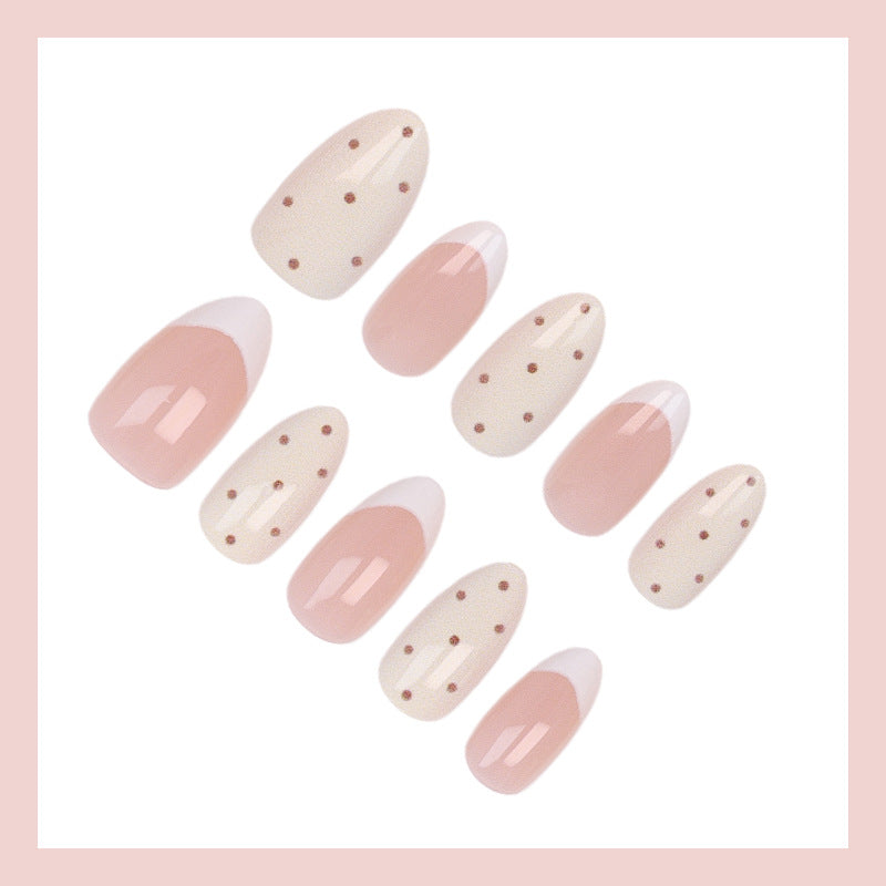 Artificial nails with elegant dots and glamorous accents Stornfield