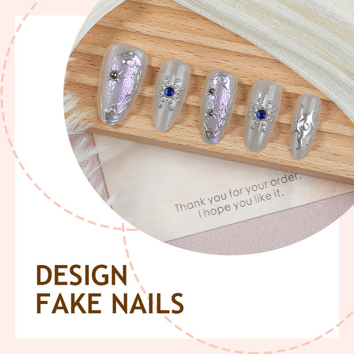 Acrylic nail set with holographic accents and elegant embellishments Stornfield