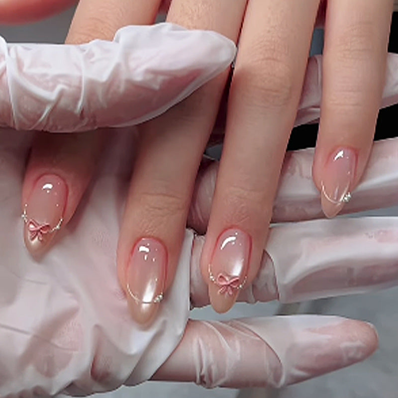 Artificial nail set with elegant bow and glitter accents Stornfield 1789119022