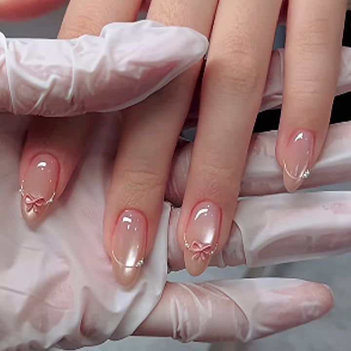 Artificial nail set with elegant bow and glitter accents Stornfield 1789119022