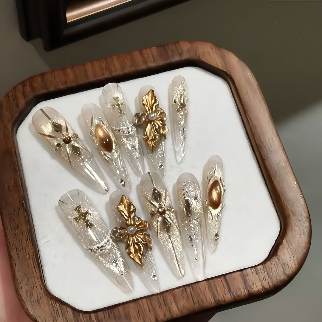 Artificial Nails in Elegant Gold Design Stornfield