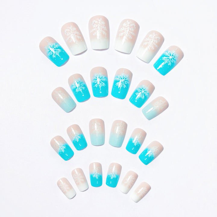 Wintry Artistic Nails with Shimmering Snowflake Design Stornfield