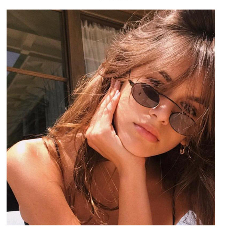 Women’s fashionable sunglasses with a unique circular frame and distinctive lenses Stornfield