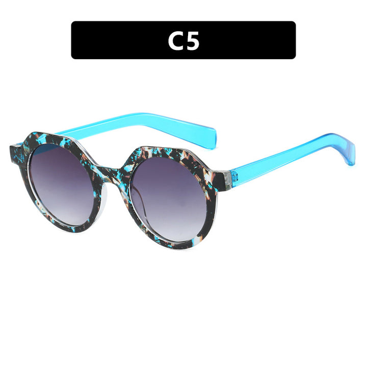 Ladies extravagant round sunglasses with colored accented frame Stornfield